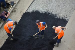 Brampton Paving Workers laying asphalt on the roadway