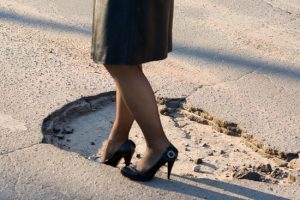 big-pothole-in-asphalt-roadway