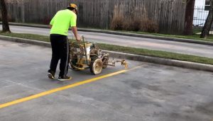 brampton paving worker striping lot