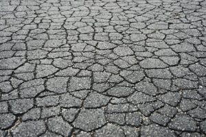 cracked asphalt roadway
