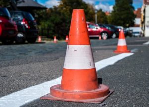 frehly-striped-road-with-cone-to-go-around